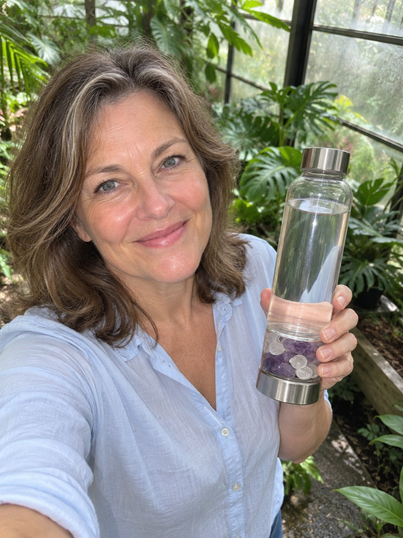 Customer holding the Elixir2Go crystal water bottle