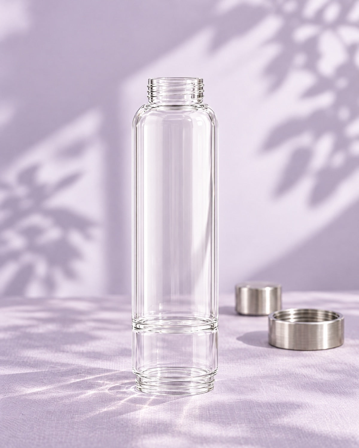 The Elixir2Go replacement glass body, with the steel top lid and base beside it ready to be reused