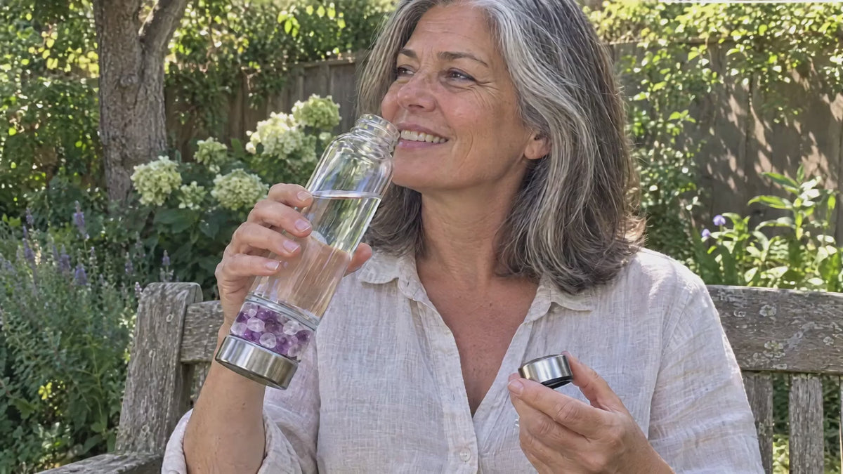 Taking a sip from an Elixir2Go in a garden